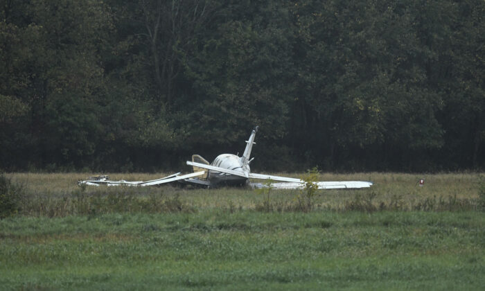 A small plane crashed in the west of Capital Region International Airport near Lansing, Mich., on Oct. 3, 2019. (Matthew Dae Smith/Lansing State Journal via AP)