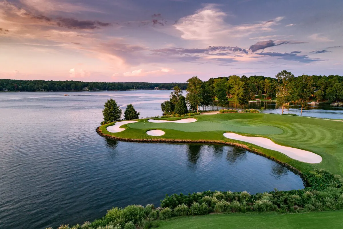 Among the amenities at Ritz Carlton Reynolds Lake Oconee, including four restaurants and a luxurious spa, are five championship golf courses laid out in natural settings. The architects and designers of the courses are Rees Jones, Tom Fazio, Bob Cupp and Jack Nicklaus, who designed the Great Waters course, shown here, that slopes to the shores of Lake Oconee. (Russell Kirk/Ritz Carlton/TNS)