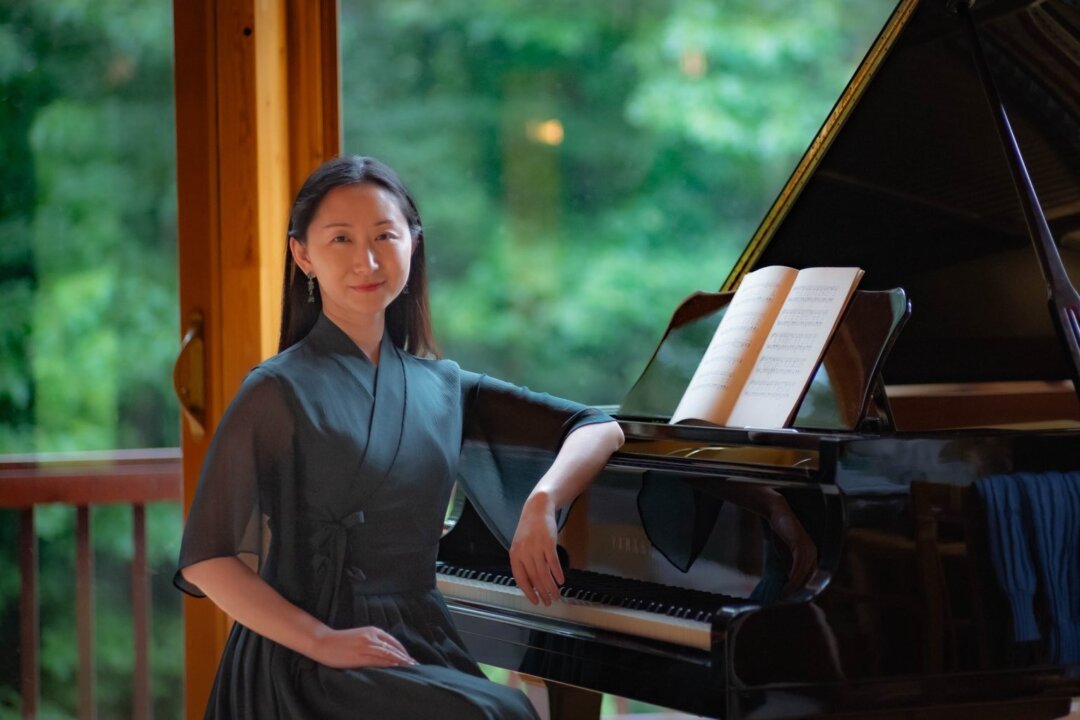 Shen Yun composer and pianist Qin Yuan arranged the commissioned piece for the 6th NTD International Piano Competition. (Courtesy of Qin Yuan)