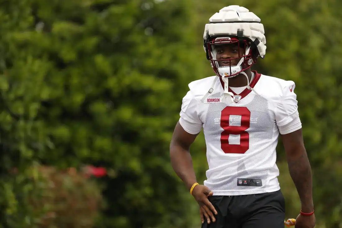 Washington Commanders running back Brian Robinson (8) walks to the field during day three of training camp at the Park in Ashburn, VA, Jul. 29, 2022. (Geoff Burke/USA TODAY Sports via Field Level Media)