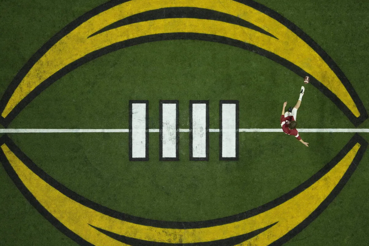 Alabama's James Burnip warms up before the College Football Playoff championship football game against Georgia, in Indianapolis on Jan. 10, 2022. (Charlie Riedel/AP Photo)
