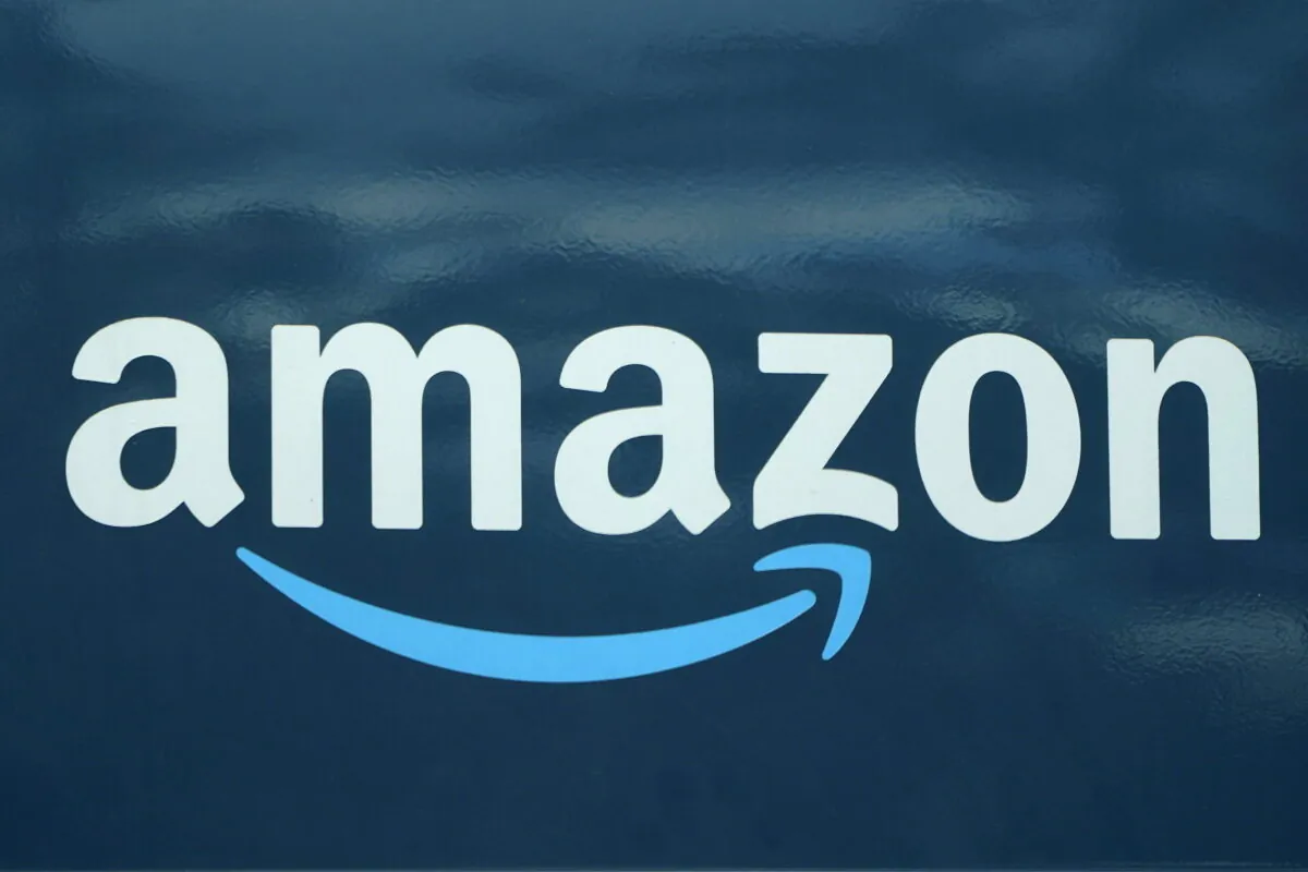 An Amazon logo appears on an Amazon delivery van in Boston, on Oct. 1, 2020. (Steven Senne/AP Photo)