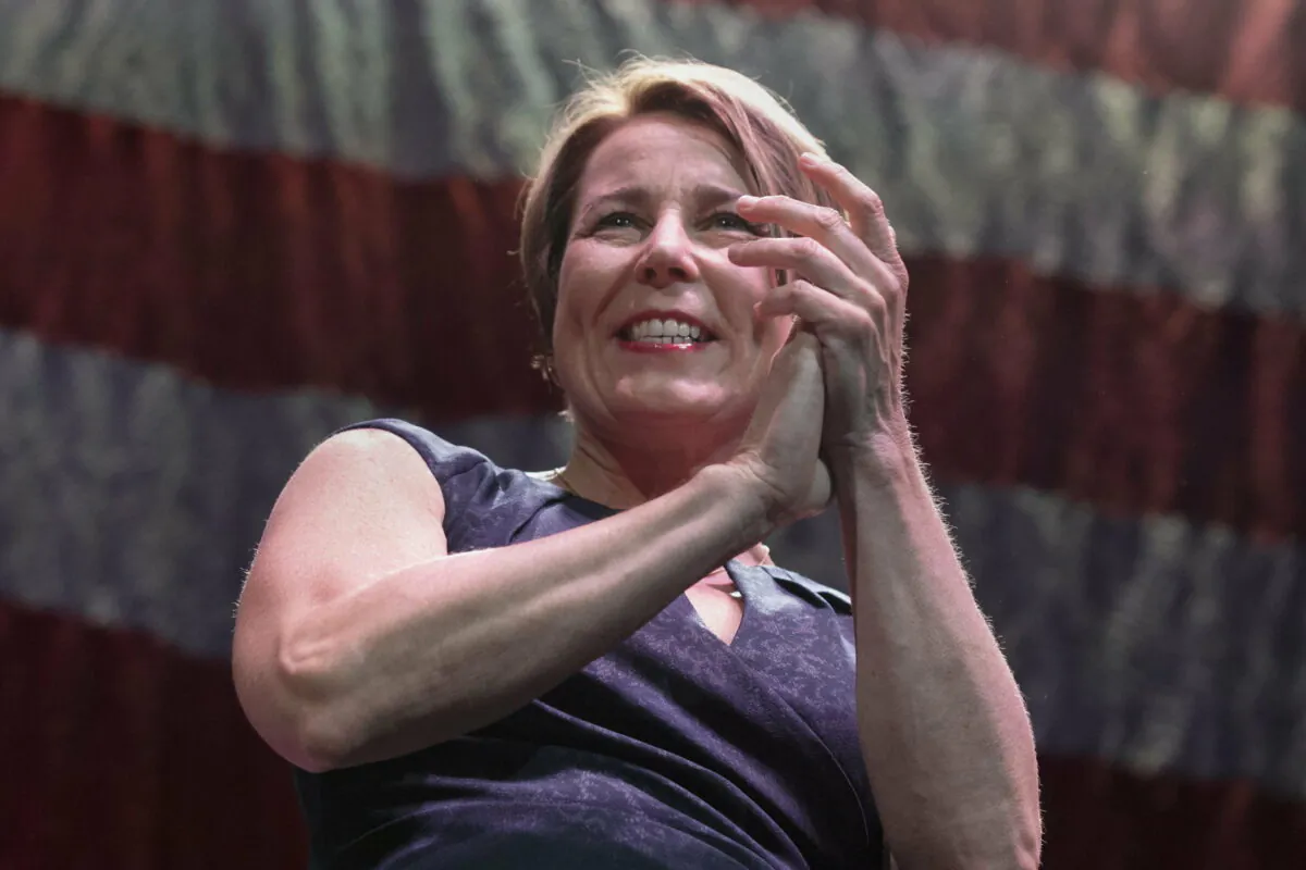 Massachusetts Attorney General, and candidate for governor, Maura Healey stands on stage during the state's Democratic party convention, June 4, 2022, in Worcester, Mass. (AP Photo/Michael Dwyer, File)