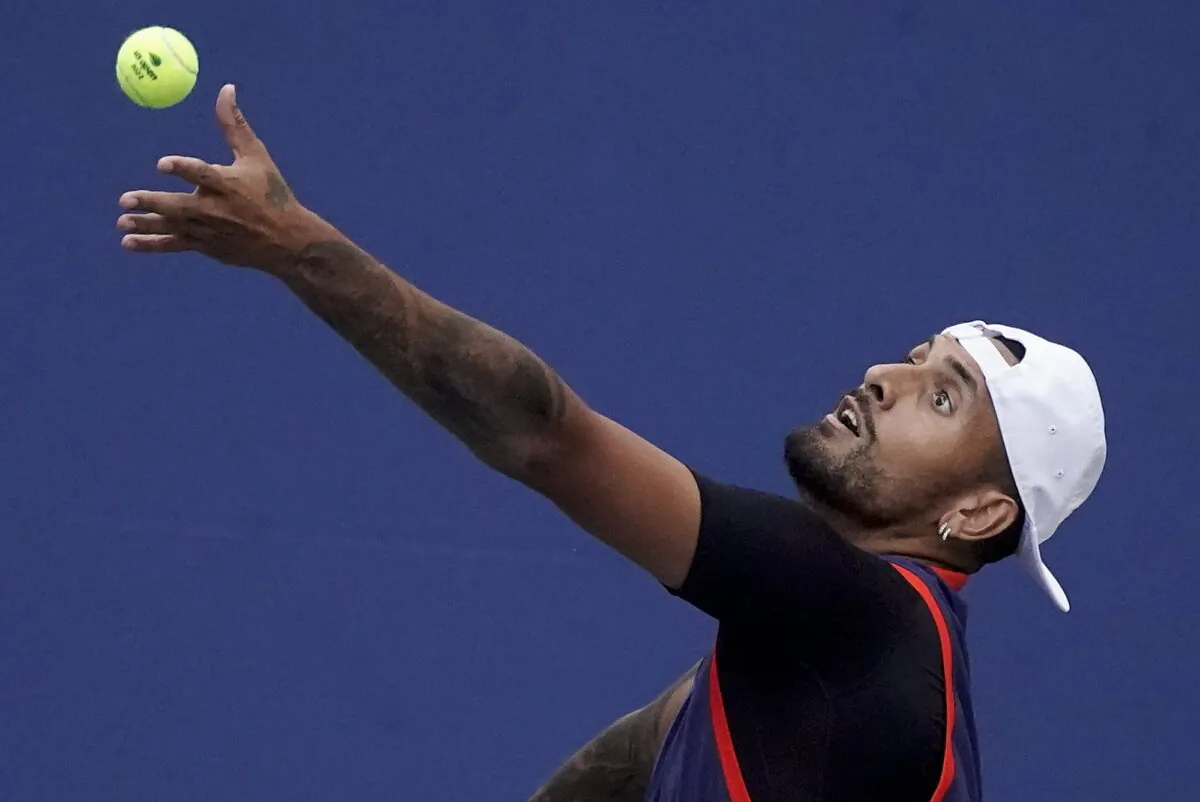 Nick Kyrgios, of Australia, serves to Benjamin Bonzi, of France, during the second round of the US Open tennis championships in New York, Aug. 31, 2022. (John Minchillo/AP Photo)
