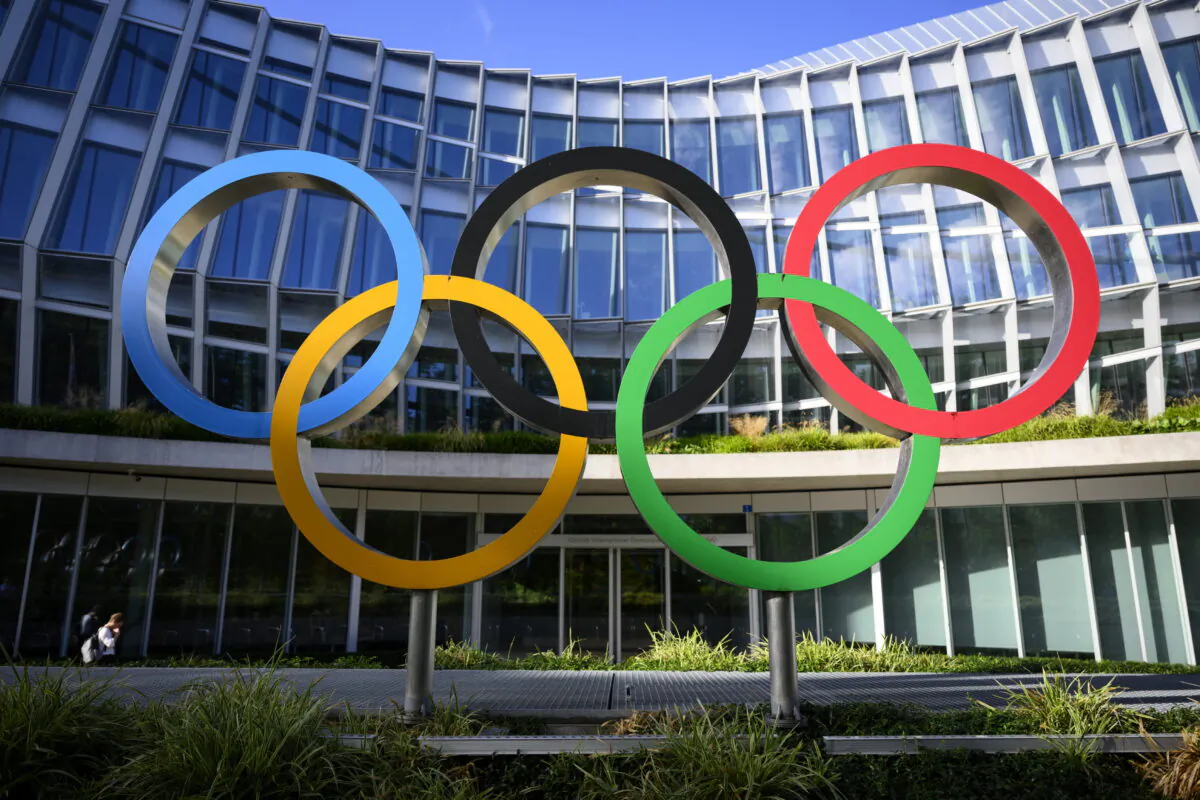 Olympic Rings in front of The Olympic House, headquarters of the International Olympic Committee (IOC) at the opening of the executive board meeting of the International Olympic Committee (IOC), in Lausanne, Switzerland, on Sept. 8, 2022. (Laurent Gillieron/Pool via AP)