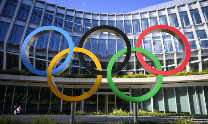 Olympic Rings in front of The Olympic House, headquarters of the International Olympic Committee (IOC) at the opening of the executive board meeting of the International Olympic Committee (IOC), in Lausanne, Switzerland, on Sept. 8, 2022. (Laurent Gillieron/Pool via AP)
