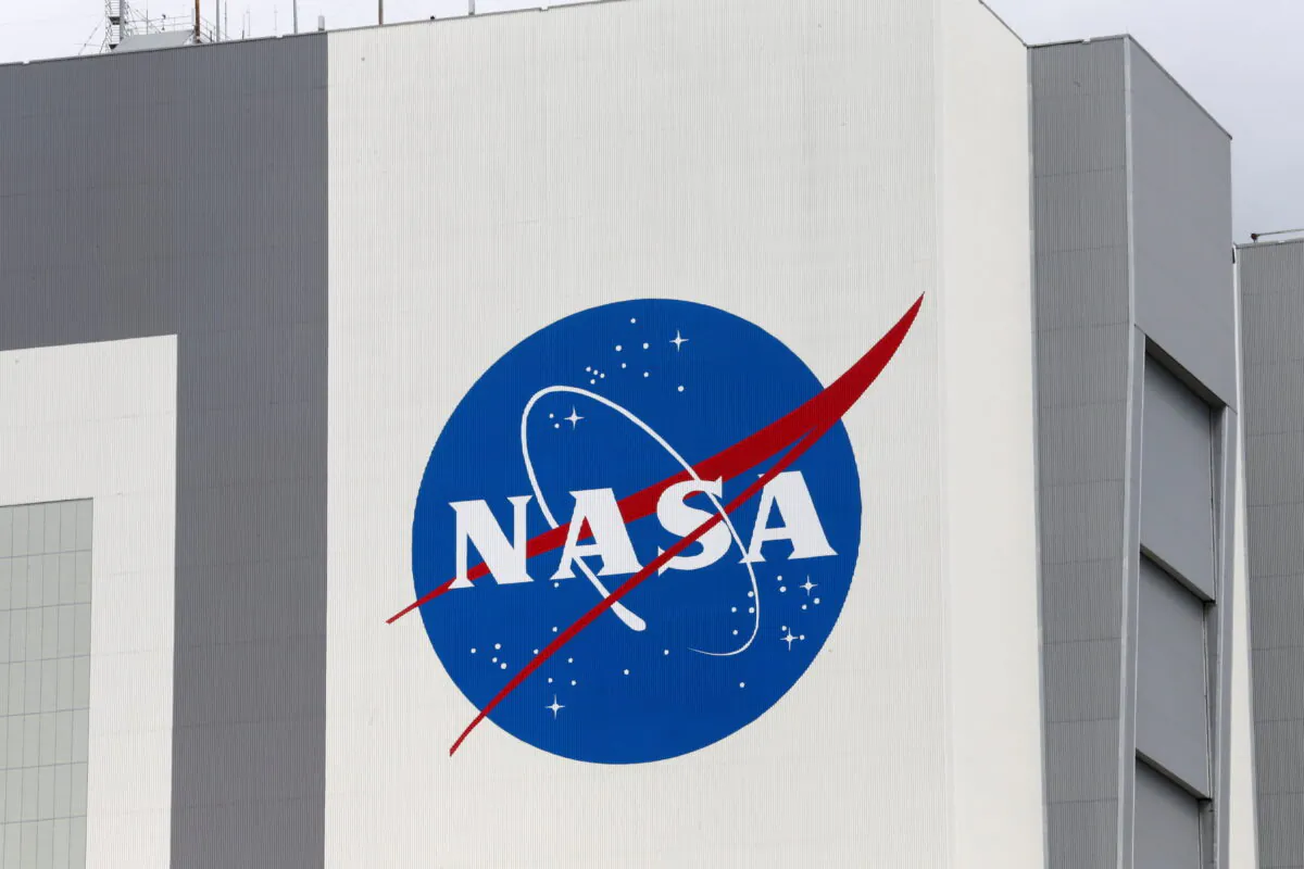 The NASA logo at Kennedy Space Center ahead of the NASA/SpaceX launch of a commercial crew mission to the International Space Station in Cape Canaveral, Fla., on April 16, 2021. (Joe Skipper/Reuters)