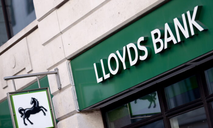 Signage at a branch of Lloyds bank in London on Oct. 31, 2021. (Tom Nicholson/Reuters)