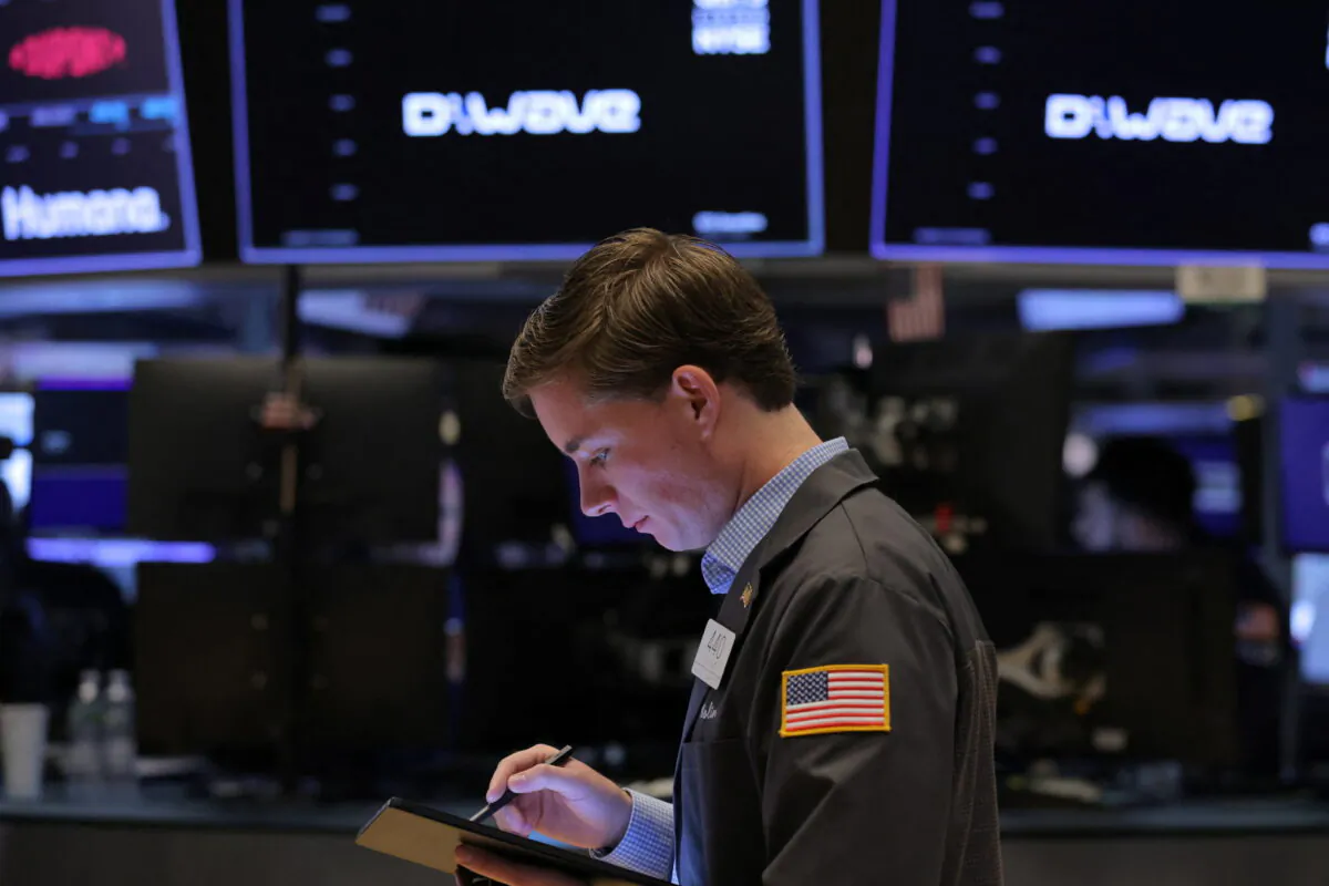 A trader works on the trading floor at the New York Stock Exchange (NYSE) in New York City, N.Y, on Aug. 8, 2022. (Andrew Kelly/Reuters)