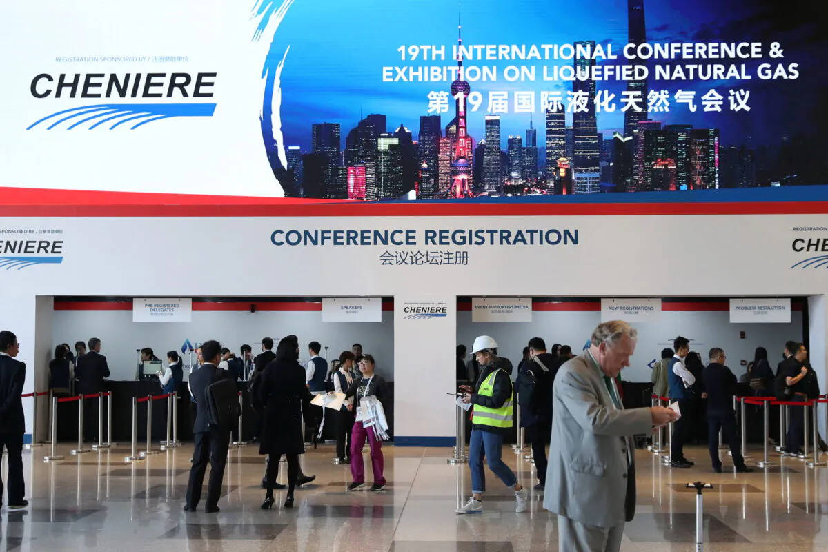 A sign of U.S LNG company Cheniere at the registration counter at the International Conference & Exhibition on Liquefied Natural Gas (LNG2019) in Shanghai on April 1, 2019. (Stringer/Reuters)