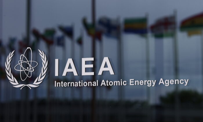 The logo of the International Atomic Energy Agency (IAEA) is seen at the IAEA headquarters in Vienna, Austria, on May 24, 2021. (Lisi Niesner/Reuters)