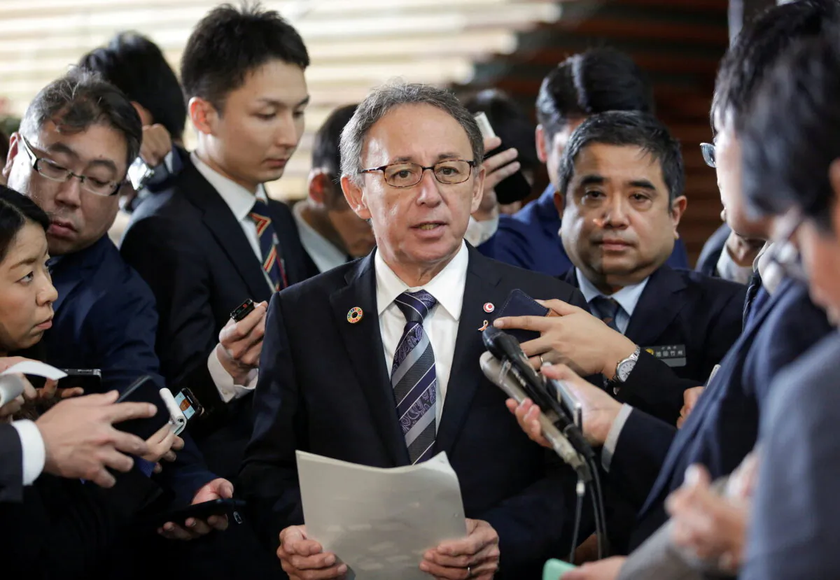 Okinawa Governor Denny Tamaki speaks to the media after a meeting with Japan's then-Prime Minister Shinzo Abe at Abe's official residence in Tokyo, Japan, on March 1, 2019. (Kimimasa Mayama/Pool via Reuters/File Photo)