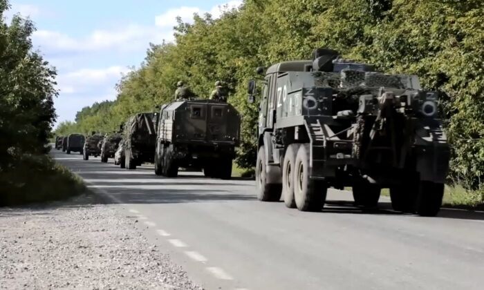 A still image from a video released by the Russian Defense Ministry shows what it said to be a Russian military convoy heading towards the frontline in Ukraine's Kharkiv region, at an unidentified location, on Sept. 2, 2022. (Russian Defense Ministry/Handout via Reuters)