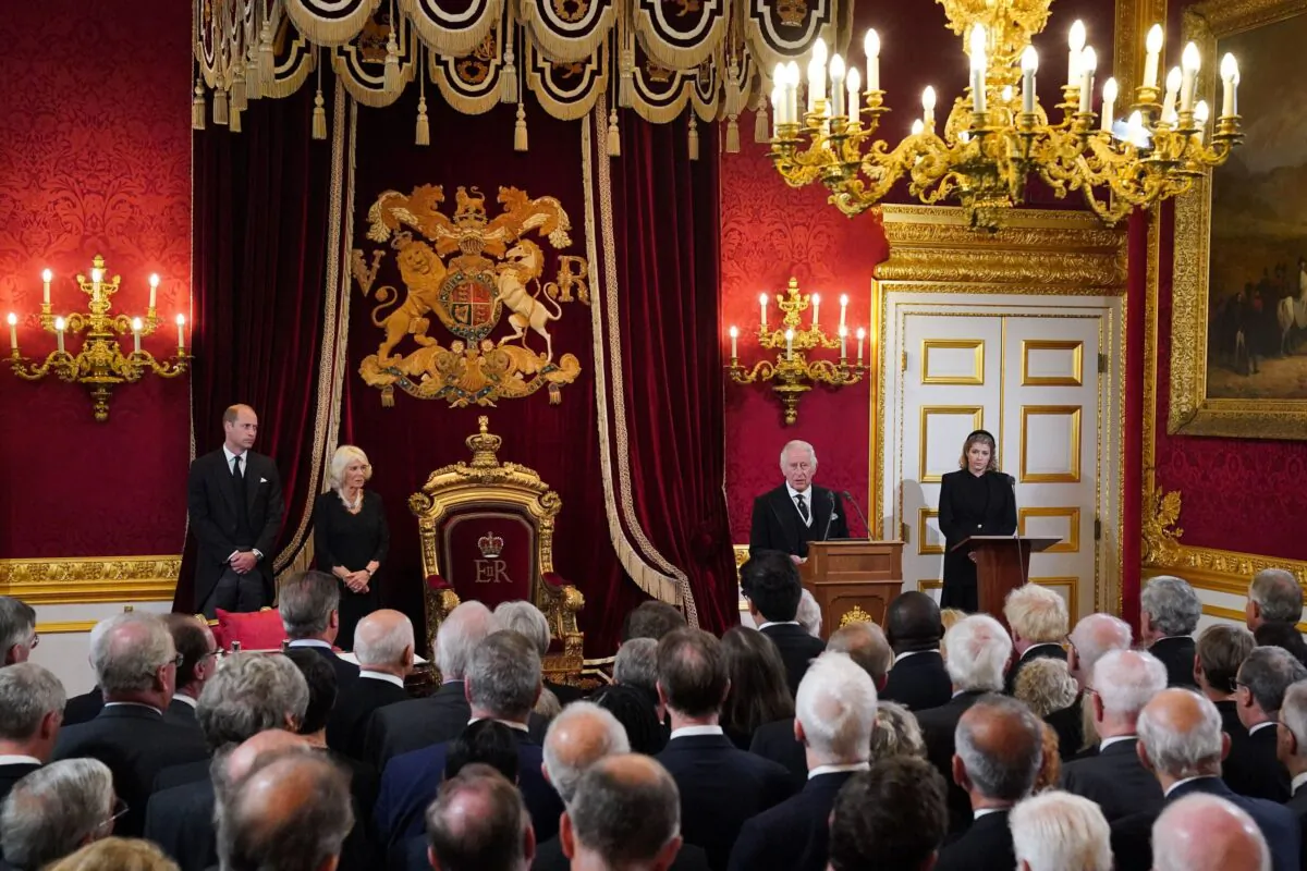 Britain's Prince William, Prince of Wales (L), Camilla, Queen Consort (2L), and Lord President of the Privy Council Penny Mordaunt (R) listen as King Charles III (2R) speaks during a meeting of the Accession Council in the Throne Room inside St James's Palace in London on Sept. 10, 2022. (Jonathan Brady/Pool/AFP via Getty Images)