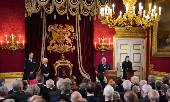 Britain's Prince William, Prince of Wales (L), Camilla, Queen Consort (2L), and Lord President of the Privy Council Penny Mordaunt (R) listen as King Charles III (2R) speaks during a meeting of the Accession Council in the Throne Room inside St James's Palace in London on Sept. 10, 2022. (Jonathan Brady/Pool/AFP via Getty Images)
