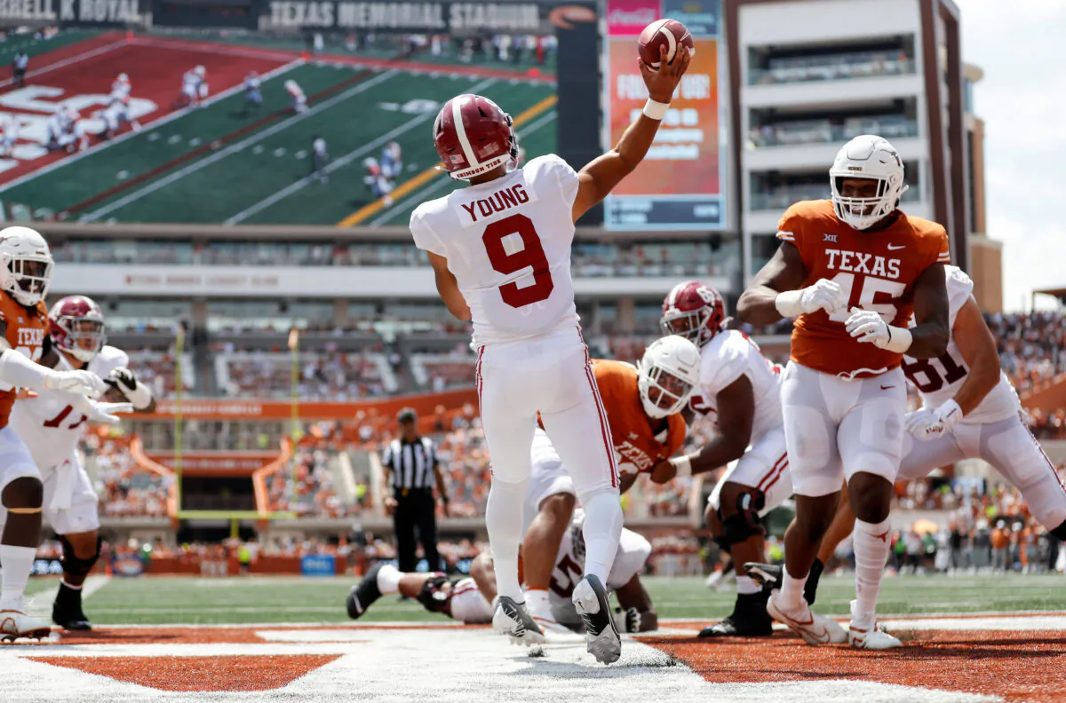 Bryce Young (9) of the Alabama Crimson Tide throws a pass from the end zone under pressure by Vernon Broughton (45) of the Texas Longhorns in the third quarter at Darrell K Royal–Texas Memorial Stadium in Austin, Tex., September 10, 2022. (Tim Warner/Getty Images)