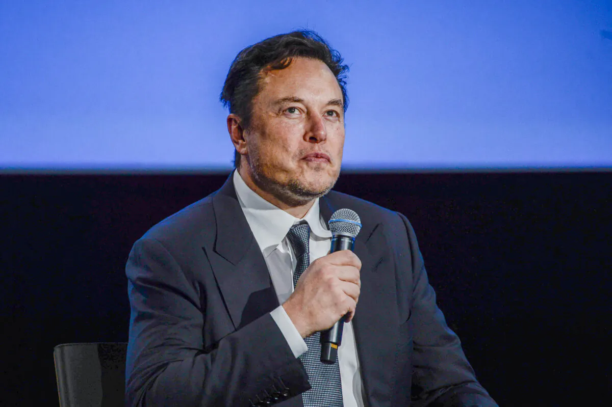 Tesla CEO Elon Musk looks up as he addresses guests at the Offshore Northern Seas 2022 (ONS) meeting in Stavanger, Norway, on Aug. 29, 2022. (Carina Johansen/NTB/AFP via Getty Images)