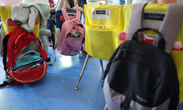 Student backpacks hang on the backs of classroom chairs at a New York City school on June 24, 2022. (Michael Loccisano/Getty Images)