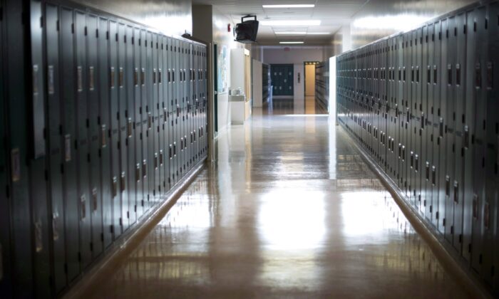 An empty hallway is seen at a secondary school in a file photo. (The Canadian Press/Jonathan Hayward)