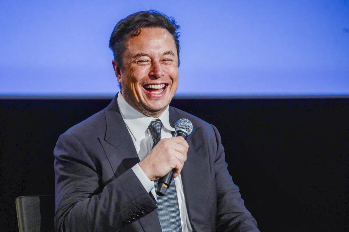 Tesla CEO Elon Musk smiles as he addresses guests at the Offshore Northern Seas 2022 (ONS) meeting in Stavanger, Norway, on Aug. 29, 2022. (Carina Johansen/NTB/AFP via Getty Images)