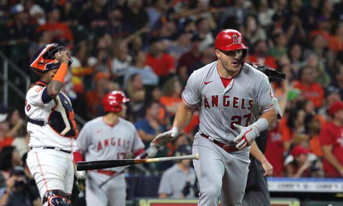 Mike Trout (27) of the Los Angeles Angels hits a three run home run in the second inning against the Houston Astros at Minute Maid Park in Houston, on Sept. 10, 2022. (Bob Levey/Getty Images)
