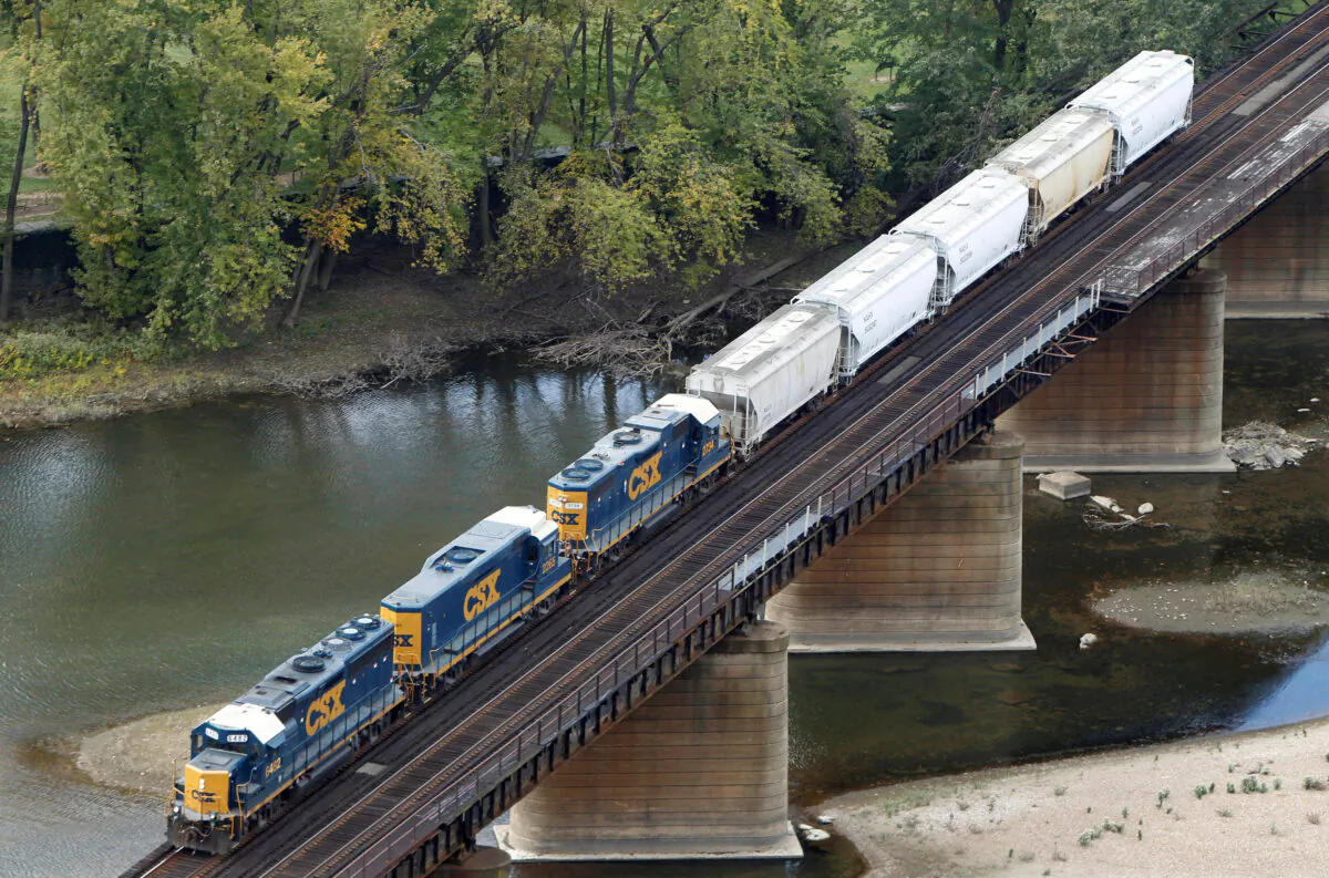 A CSX freight train crosses the Potomac River in Harpers Ferry, West Va., on Oct. 16, 2012. (Gary Cameron/Reuters)