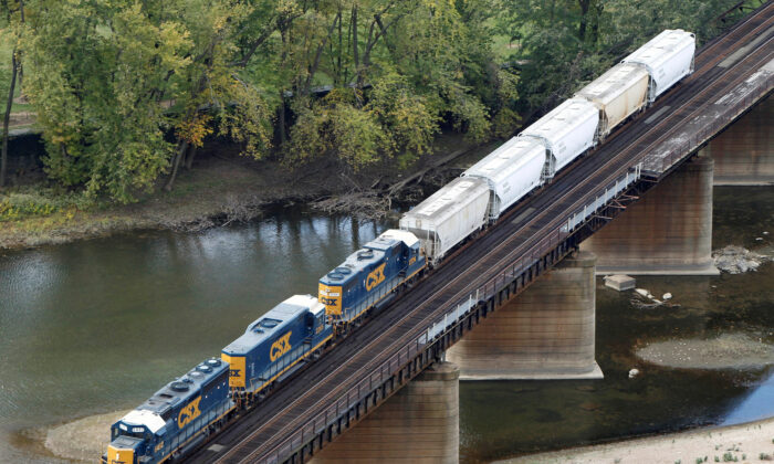 A CSX freight train crosses the Potomac River in Harpers Ferry, West Va., on Oct. 16, 2012. (Gary Cameron/Reuters)