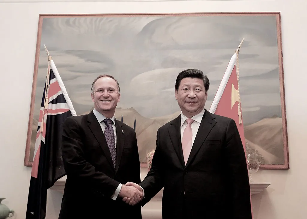 Prime Minister John Key shakes hands with The President of the People's Republic of China, Xi Jinping at Premier House in Wellington, New Zealand, on Nov. 20, 2014. (Ross Giblin - Pool/Getty Images)
