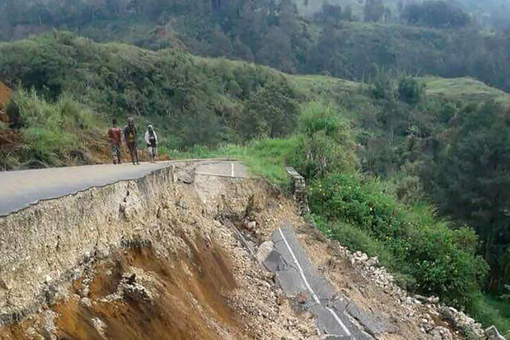 An earthquake damaged road near Mendi in Papua New Guinea's highlands region on Feb. 27, 2018 after a 7.5-magnitude earthquake.
(Melvin Levongo/AFP via Getty Images)