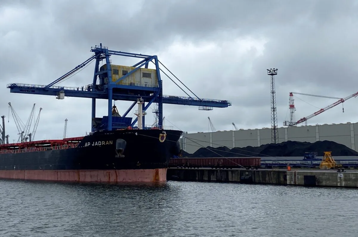 The Russian freighter "Ap Jadran" is unloaded from its hard coal cargo at the Baltic Sea harbor of Rostock, Germany, on Aug. 5, 2022. (Andreas Rinke/Reuters)