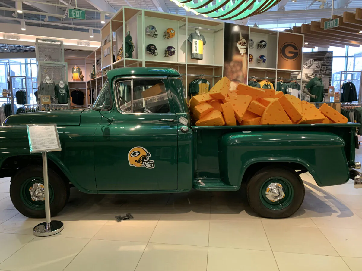 A Packer-green truck filled with faux blocks of cheese takes the spotlight in the gift shop of Lambeau Field in Green Bay, Wisconsin. (Photo courtesy of Glenda Winders.)