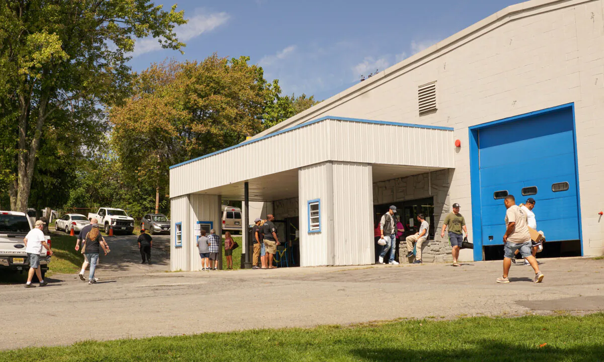 People come in and out of Middletown Gun Show at Orange County Fairgrounds in Middletown, New York on September 20, 2022. (Cara Ding/The Epoch Times)