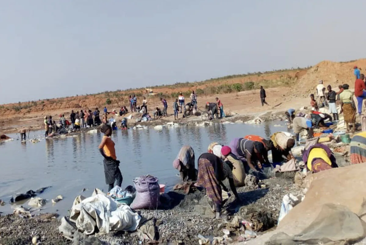 Miners at a cobalt cleaning site in Lualaba Province, the Democratic Republic of the Congo. (Northwestern Now)