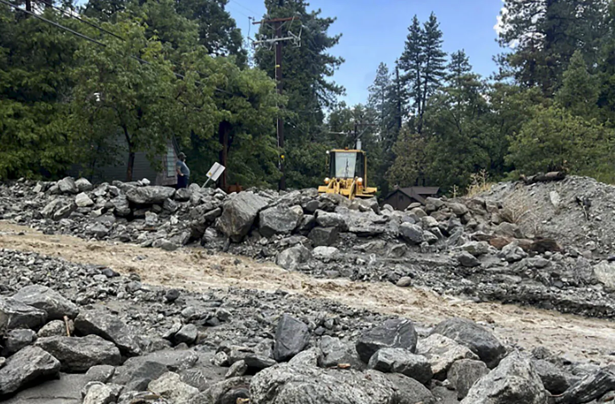A mudslide flows near a road in Forest Falls, San Bernardino County, Calif., on Sept. 12, 2022. (San Bernardino County Fire Department via AP)