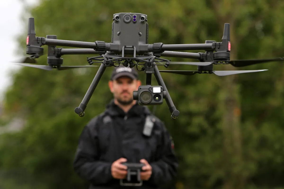 A police sergeant in Exeter, England, pilots a DJI drone on May 25, 2021, as part of security preparations for the G-7 Summit that was attended by U.S. President Joe Biden and leaders of the other G-7 countries. (Geoff Caddick/AFP via Getty Images)