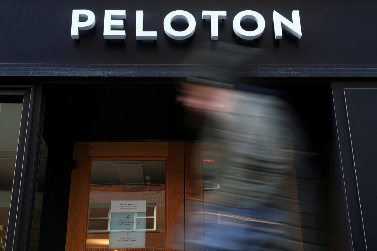 A person walks past a Peloton store in the Manhattan borough of New York on Jan. 25, 2022. (Carlo Allegri/Reuters)
