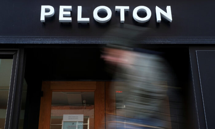 A person walks past a Peloton store in the Manhattan borough of New York on Jan. 25, 2022. (Carlo Allegri/Reuters)