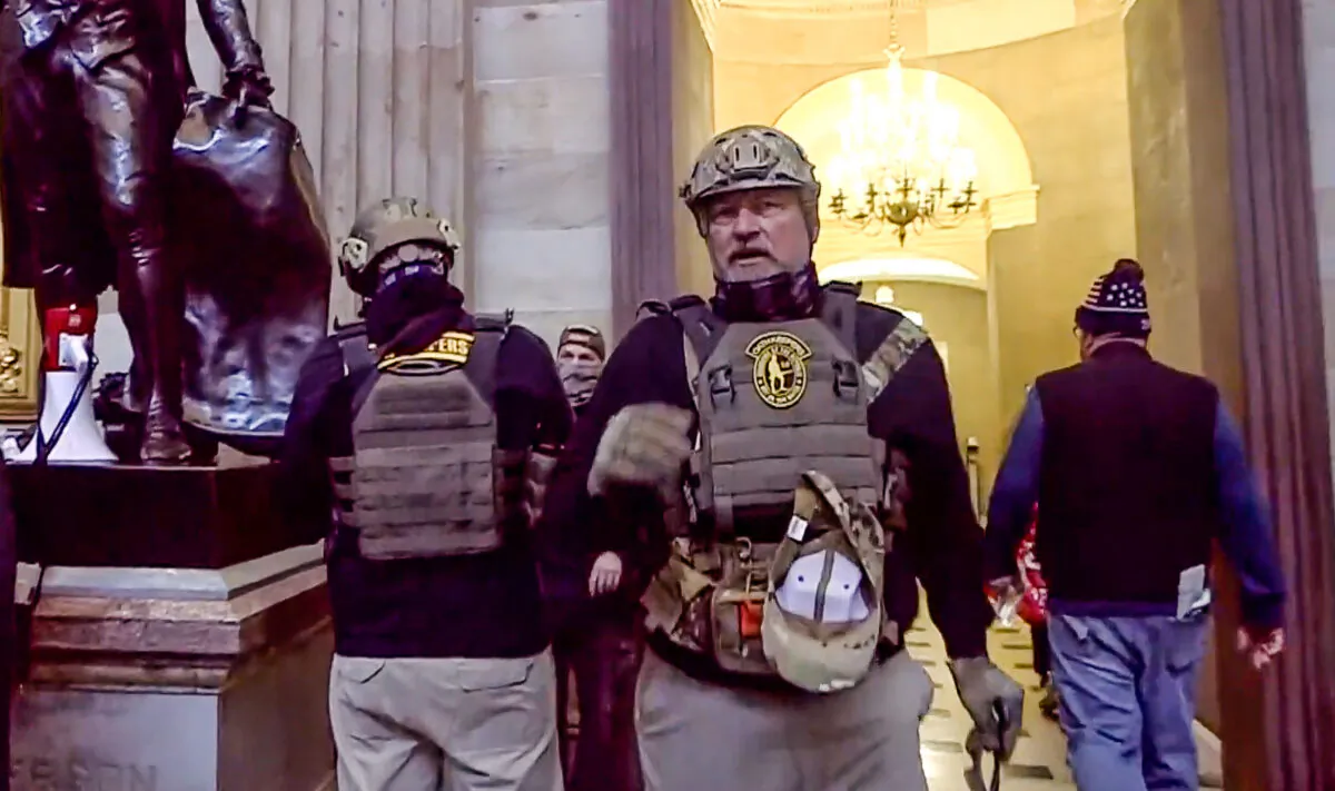 Two Oath Keepers inside the U.S. Capitol on Jan. 6, 2021. (U.S. DOJ/Screenshot via The Epoch Times)