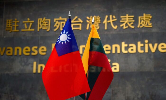 Taiwanese and Lithuanian flags at the Taiwanese Representative Office in Vilnius, Lithuania, on Jan. 20, 2022. (Janis Laizans/Reuters)