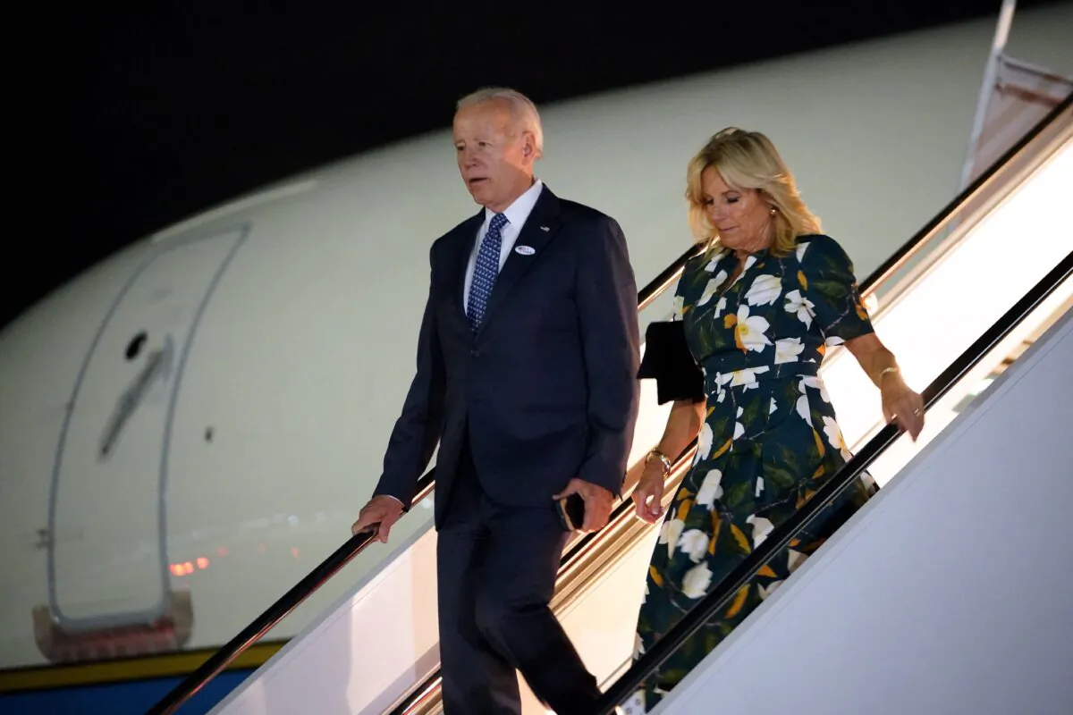 President Joe Biden and First Lady Jill Biden step off Air Force One upon arrival at Andrews Air Force Base in Maryland on Sept. 13, 2022. Biden traveled to Wilmington, Delaware, to vote in the primary election. (Mandel Ngan/AFP via Getty Images)