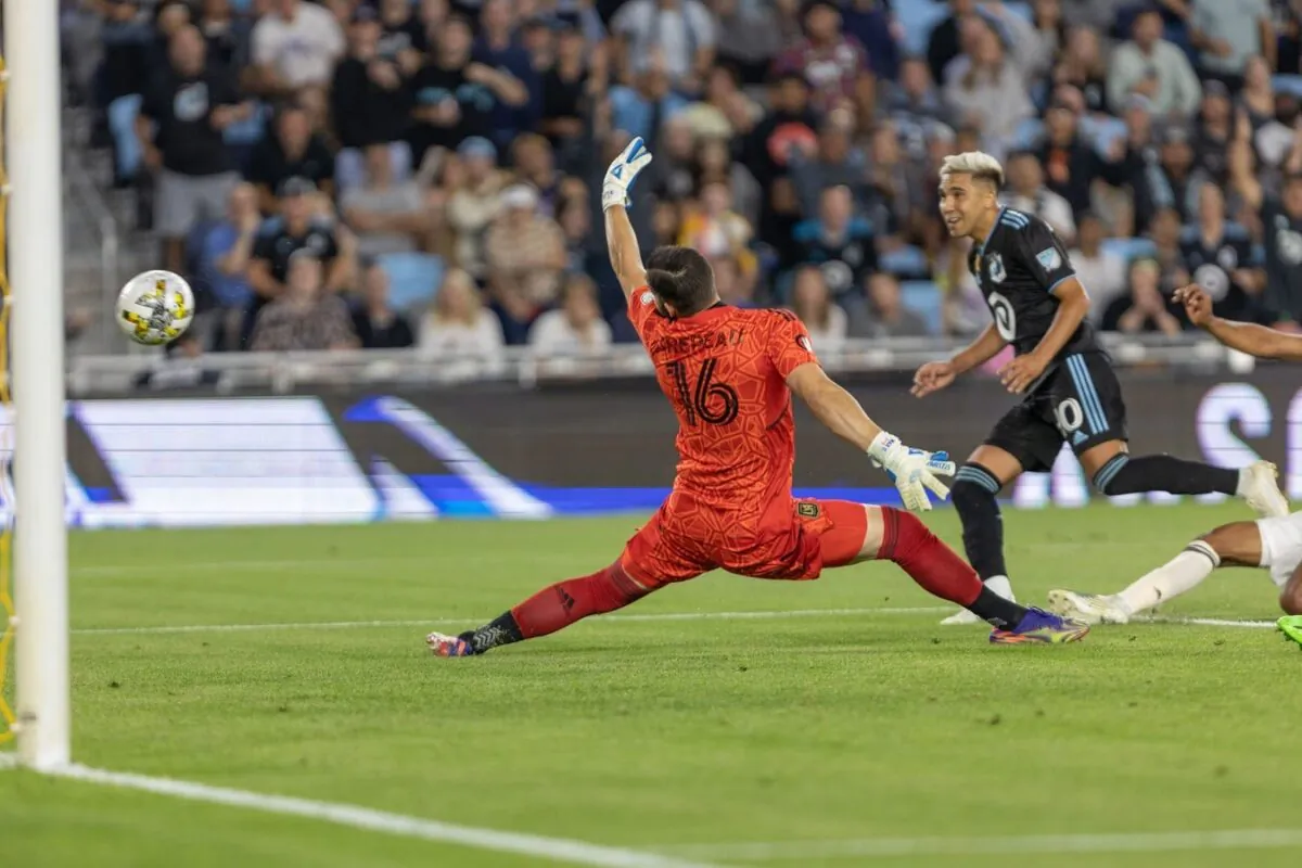 Los Angeles FC goalkeeper Maxime Crepeau (16) makes a save against Minnesota United midfielder Emanuel Reynoso (10) in the first half at Allianz Field in Saint Paul, Minn., on Sept. 13, 2022. (Matt Blewett/USA TODAY Sports via Field Level Media)