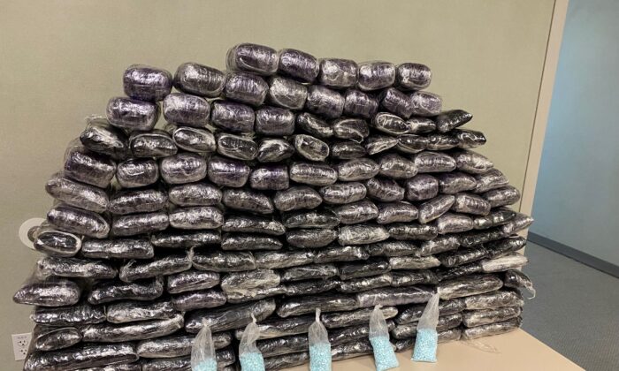 Some of the approximately 1 million fake pills containing fentanyl that were seized when agents served a search warrant at a home in Inglewood, Calif., on July 5, 2022. (Drug Enforcement Administration via AP)