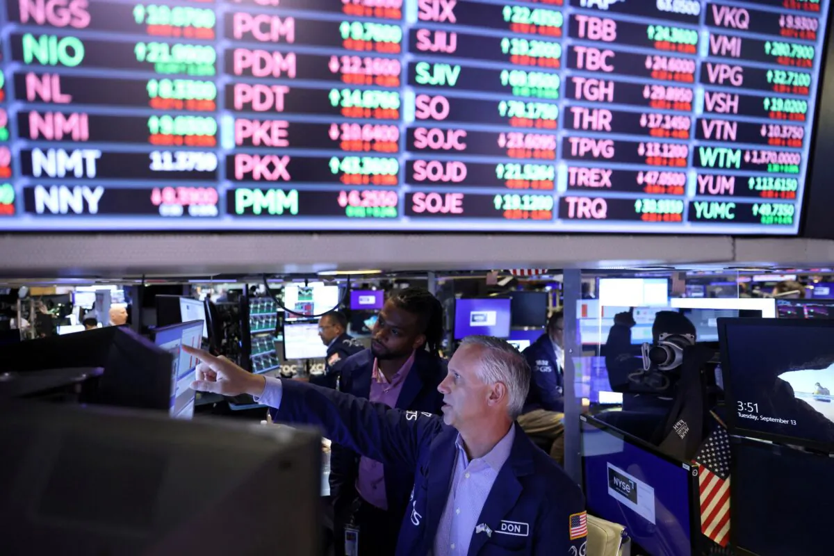 Traders work on the trading floor at the New York Stock Exchange (NYSE) in Manhattan, New York City on Sept. 13, 2022. (Andrew Kelly/Reuters)