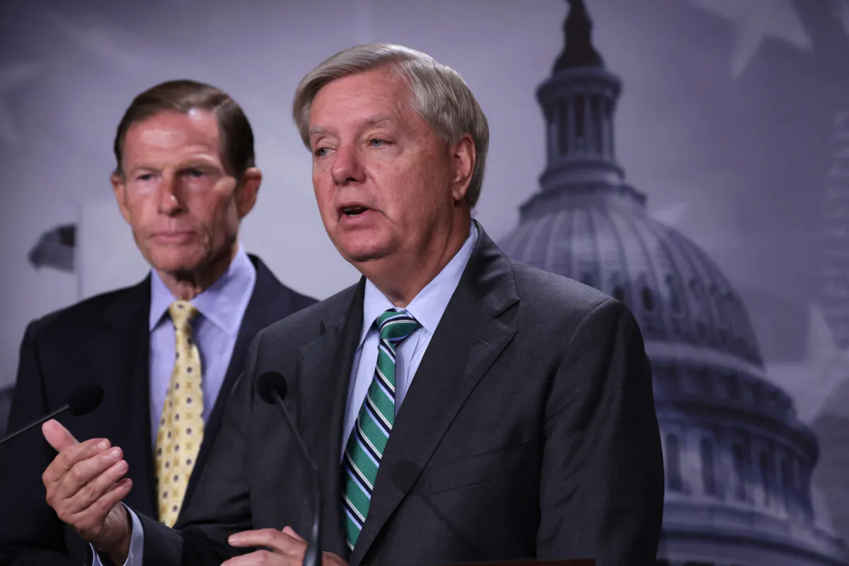 U.S. Sens. Lindsey Graham (R-S.C.) (R) and Richard Blumenthal (D-Conn.) (L) speak to members of the press during a news conference at the U.S. Capitol in Washington, on Sept. 14, 2022. (Alex Wong/Getty Images)