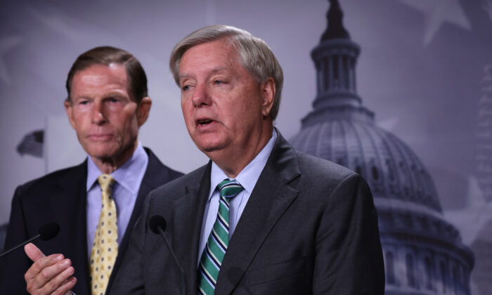U.S. Sens. Lindsey Graham (R-S.C.) (R) and Richard Blumenthal (D-Conn.) (L) speak to members of the press during a news conference at the U.S. Capitol in Washington, on Sept. 14, 2022. (Alex Wong/Getty Images)