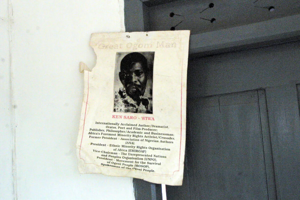 A poster showing late Ogoni human rights activists Ken Saro-Wiwa hangs at his father's sitting room at Bane town, Nigeria, on Nov. 19, 2003. (Pius Utomi Ekpei/AFP via Getty Images)