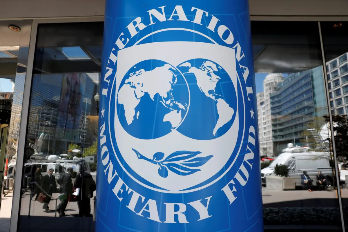 International Monetary Fund logo outside the headquarters building during the IMF/World Bank spring meeting in Washington on April 20, 2018. (Yuri Gripas/Reuters)