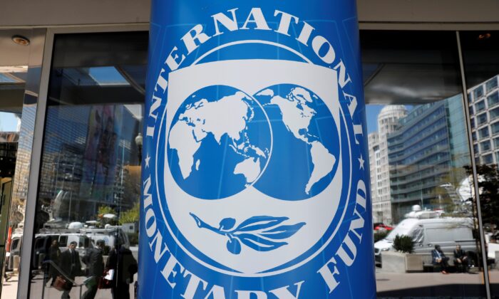 International Monetary Fund logo outside the headquarters building during the IMF/World Bank spring meeting in Washington on April 20, 2018. (Yuri Gripas/Reuters)