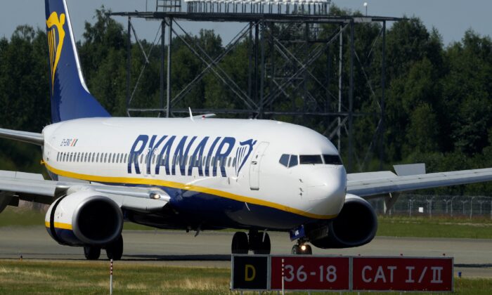 Ryanair aircraft Boeing 737-8AS lands at Riga International Airport in Latvia on July 21, 2022. (Ints Kalnins/Reuters)