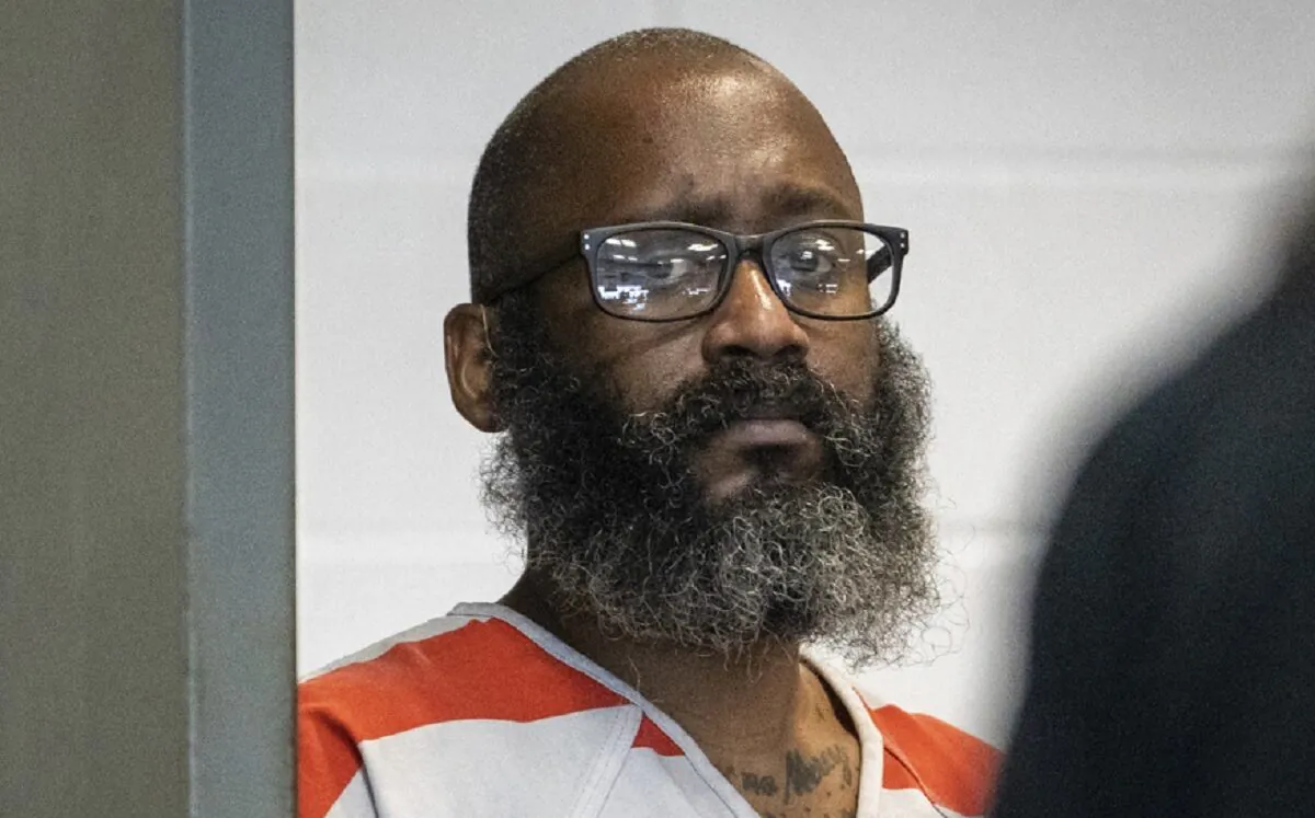 Stephen Broderick enters the 299th District Courtroom to plead guilty and receive a sentence for the 2021 murder of his ex-wife, Amanda Broderick, teenage stepdaughter Alyssa Broderick and his stepdaughter's boyfriend, Willie Simmons III, in Austin, Texas, on Sept. 13, 2022. (Sara Diggins/Austin American-Statesman via AP)